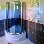 Дом отдыха Mazurskie Chatki W Skarpie *