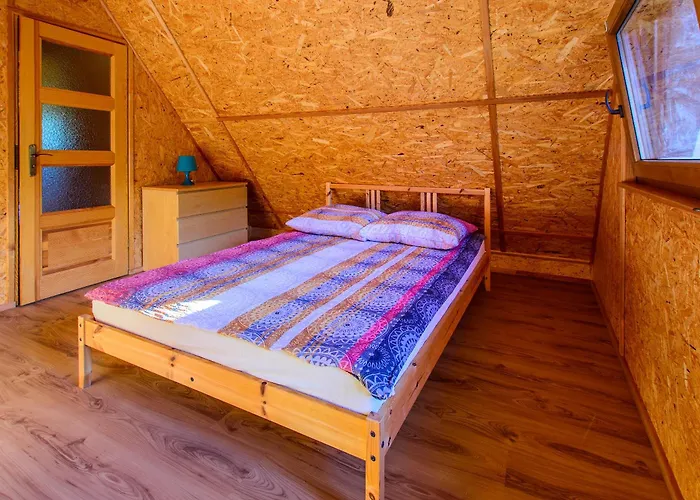 Дом отдыха Mazurskie Chatki W Skarpie *